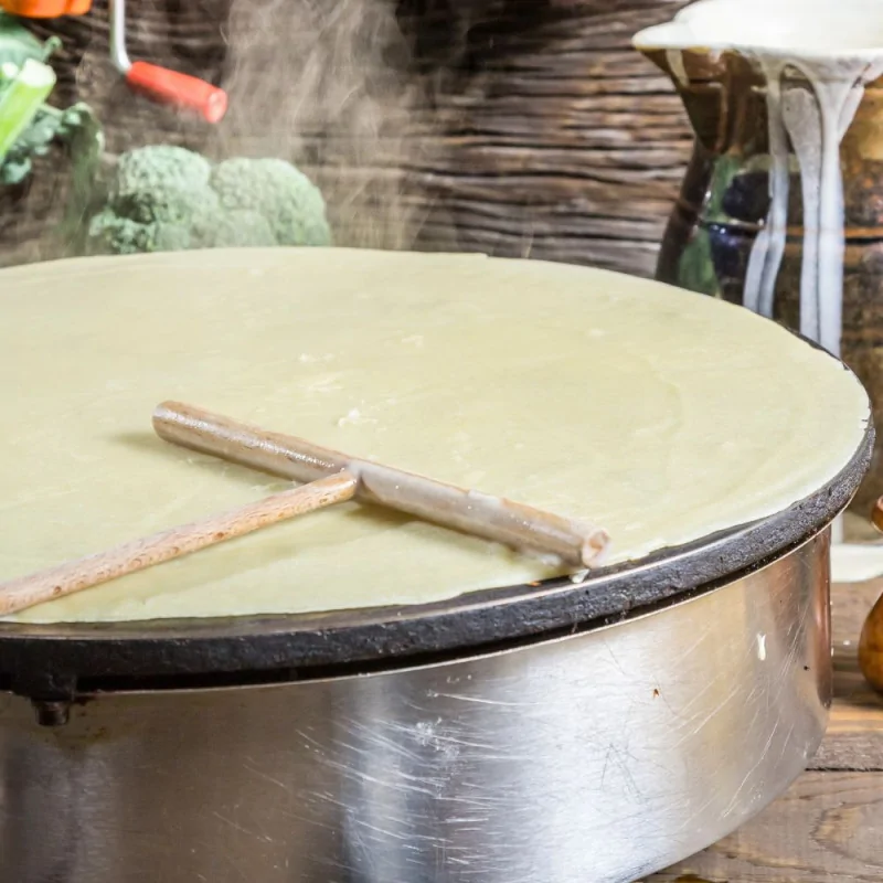 Râteau à crêpes rond en bois ambiance